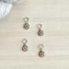Marqueurs de maille mandala verts et roses de petite taille pour les aiguilles à tricoter fines ou à chaussettes.
